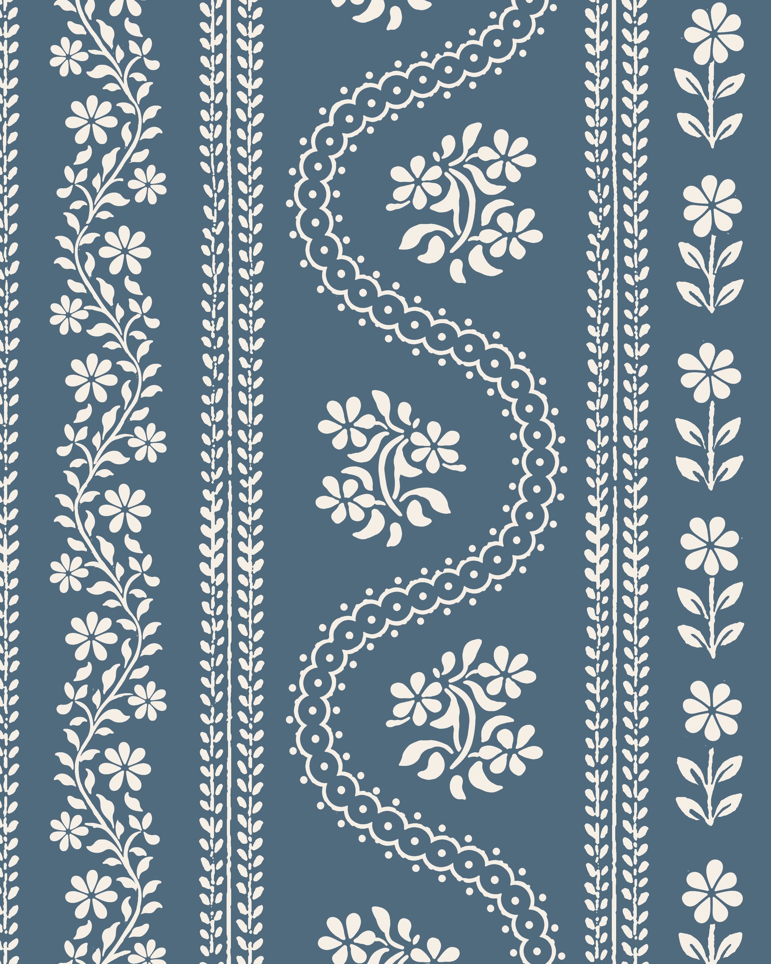A serpentine textile-style pattern with vertical bands of white floral and decorative motifs on a muted french blue background.