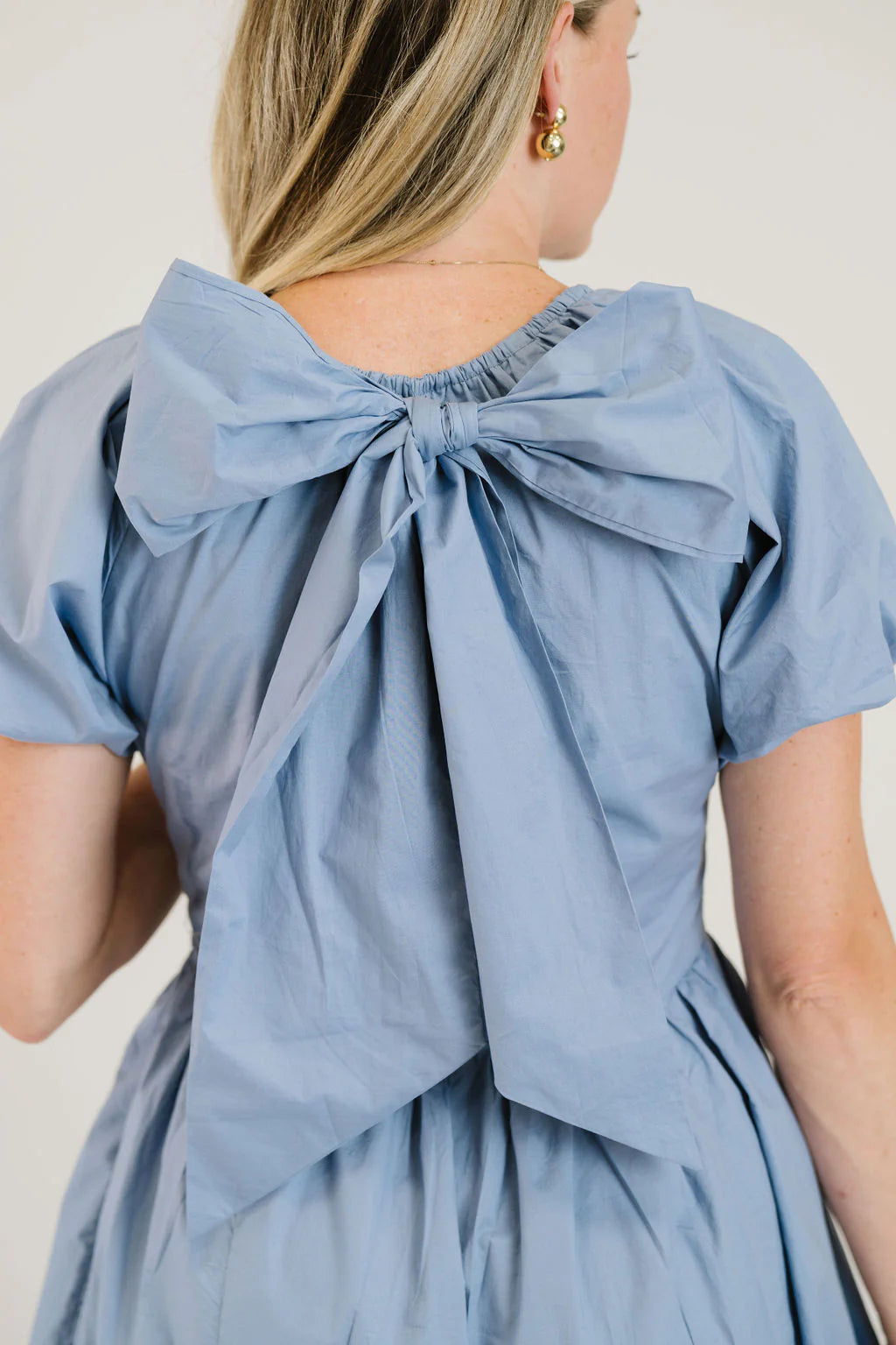 The Bow Dress in Dusty Blue